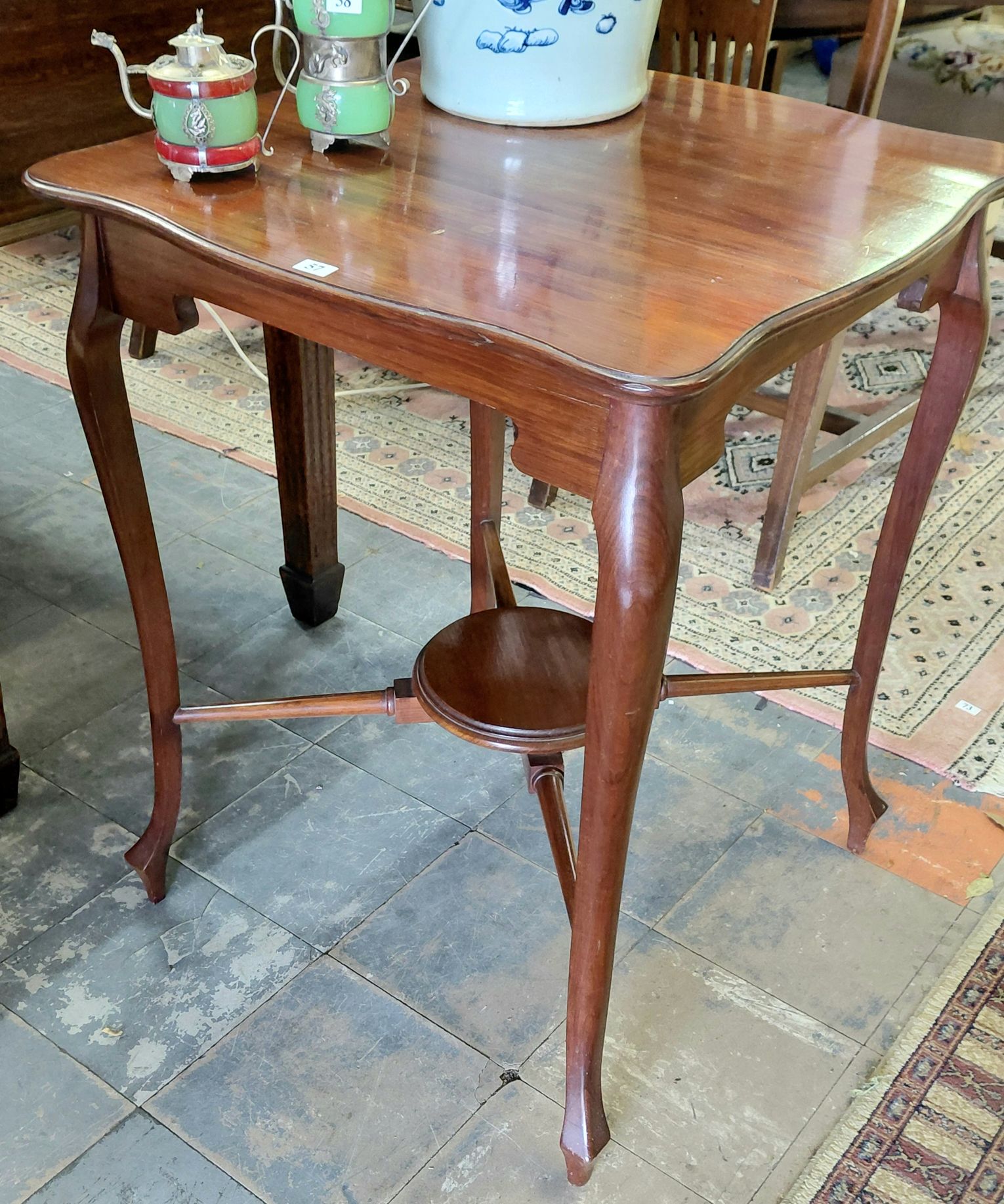 57 · OCCASIONAL TABLE