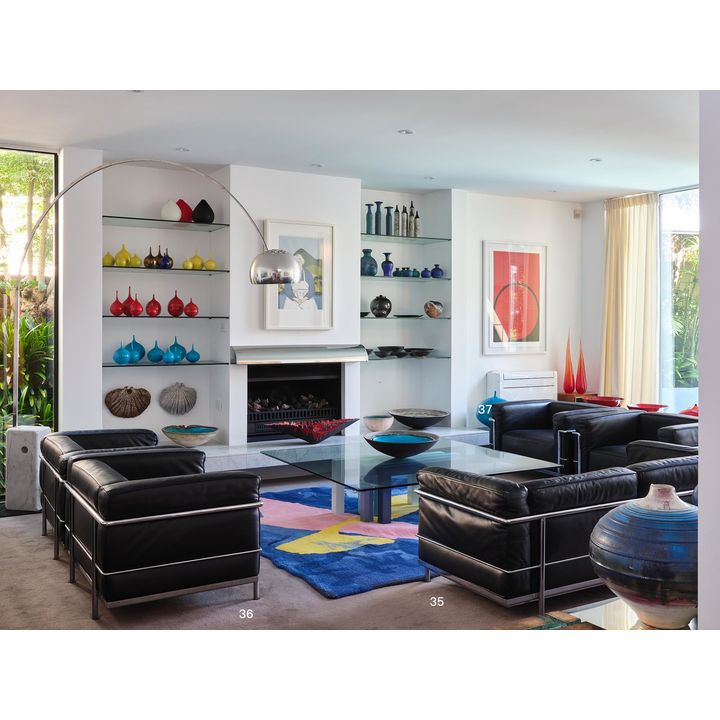 A pair of genuine Le Corbusier, Pierre Jeanneret and Charlotte Perriand designed LC2 Armchairs