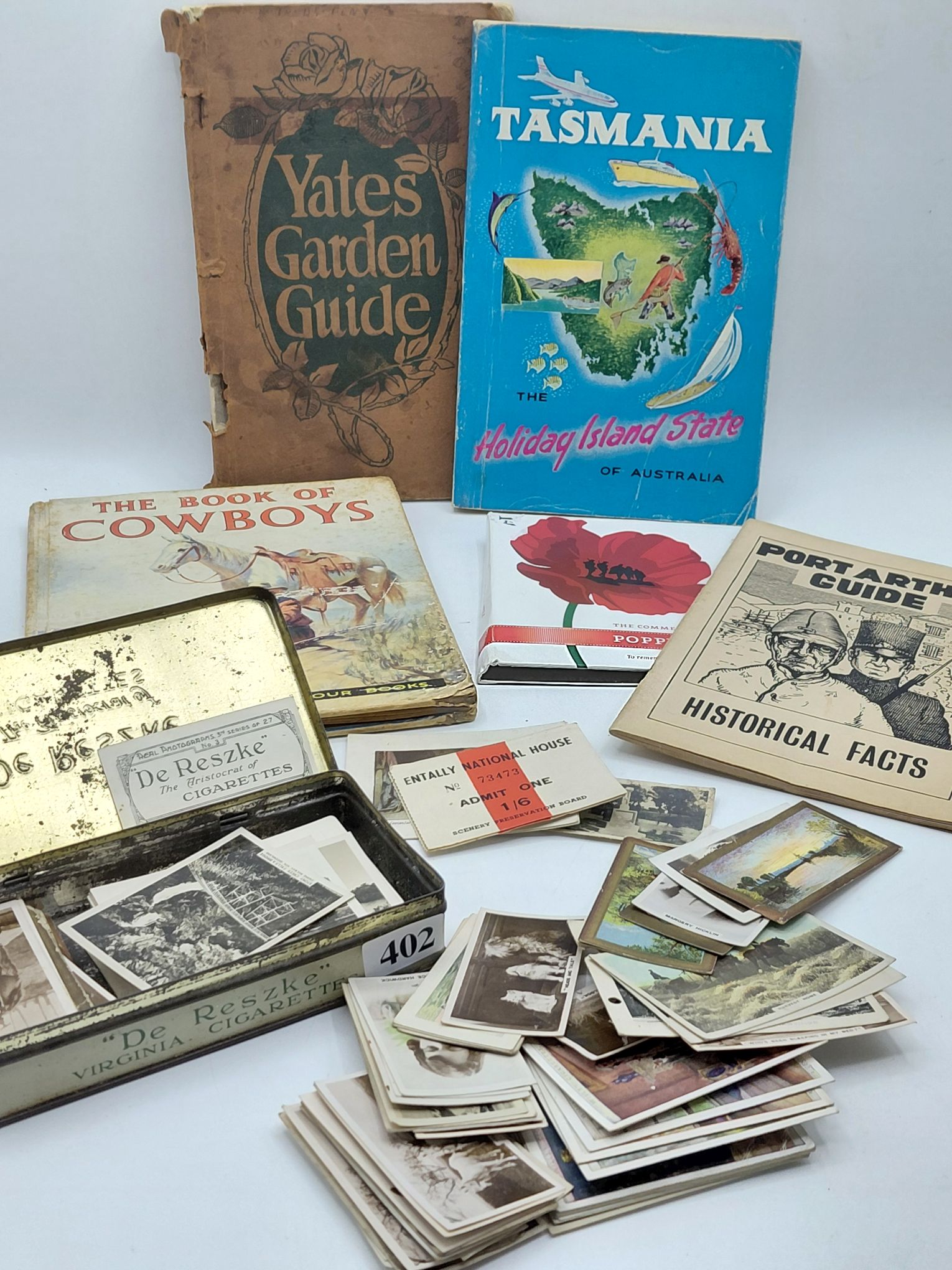 402 · TOBACCO TIN WITH CIGARETTE CARDS
