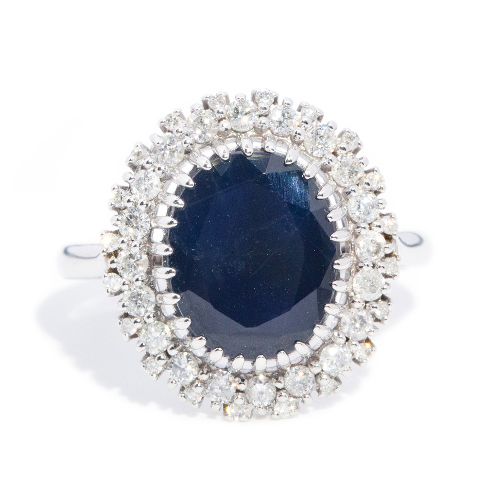 60 · 5.27 Carat Dark Blue Sapphire & Diamond Halo Ring 14ct Gold