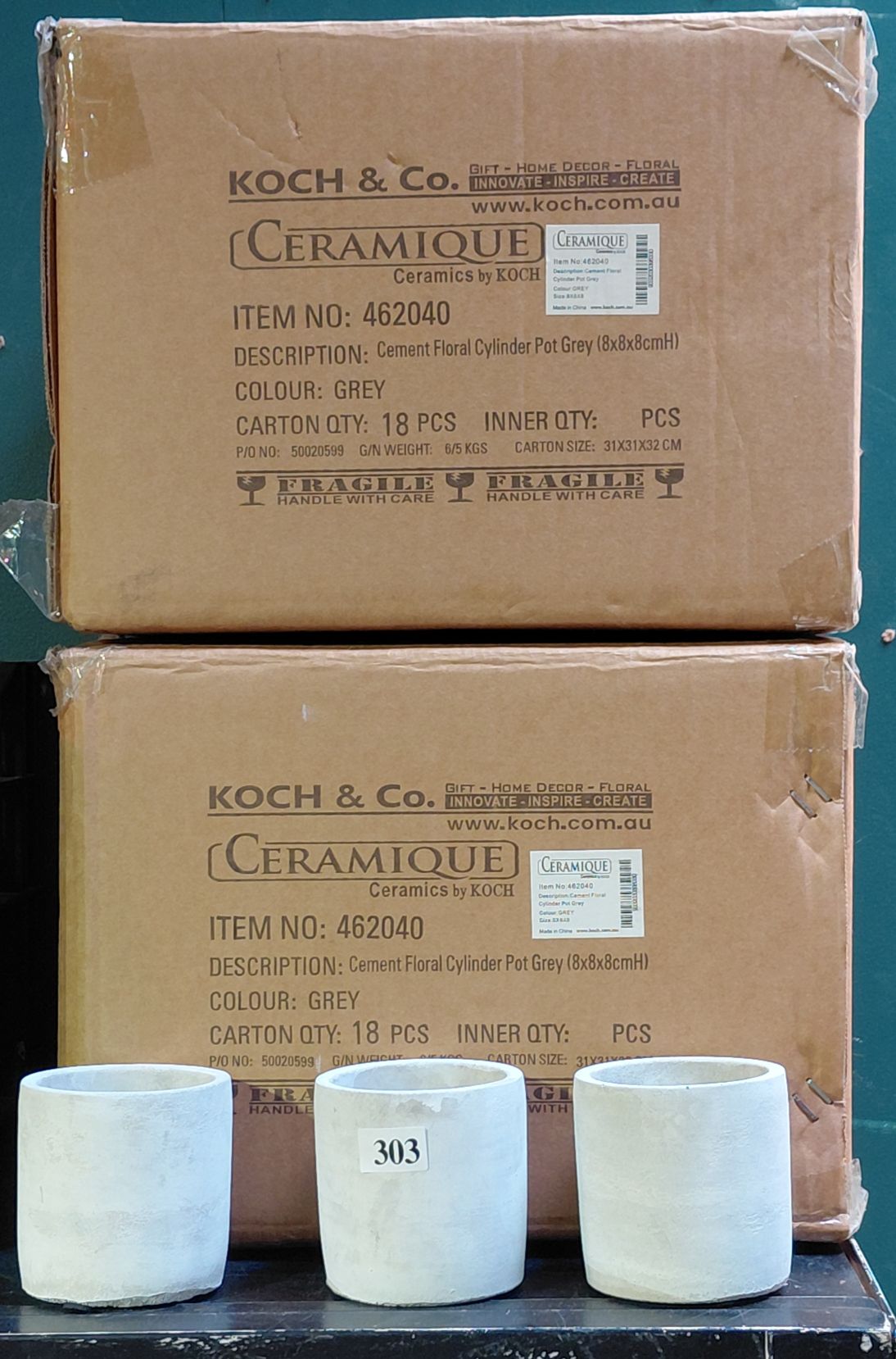 303 · CEMENT FLORISTS VASES