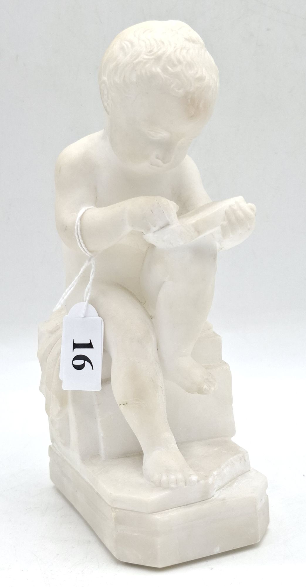 16 · ALABASTER CHILD SCULPTURE