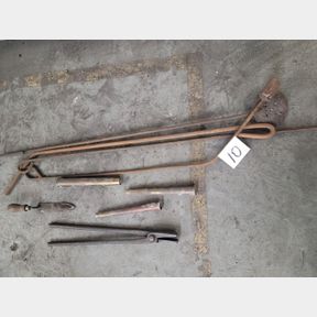 Blacksmith tongs, assorted foundry tools, mold hole funnels