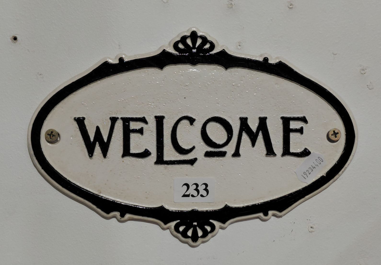 233 · CAST IRON 'WELCOME' SIGN