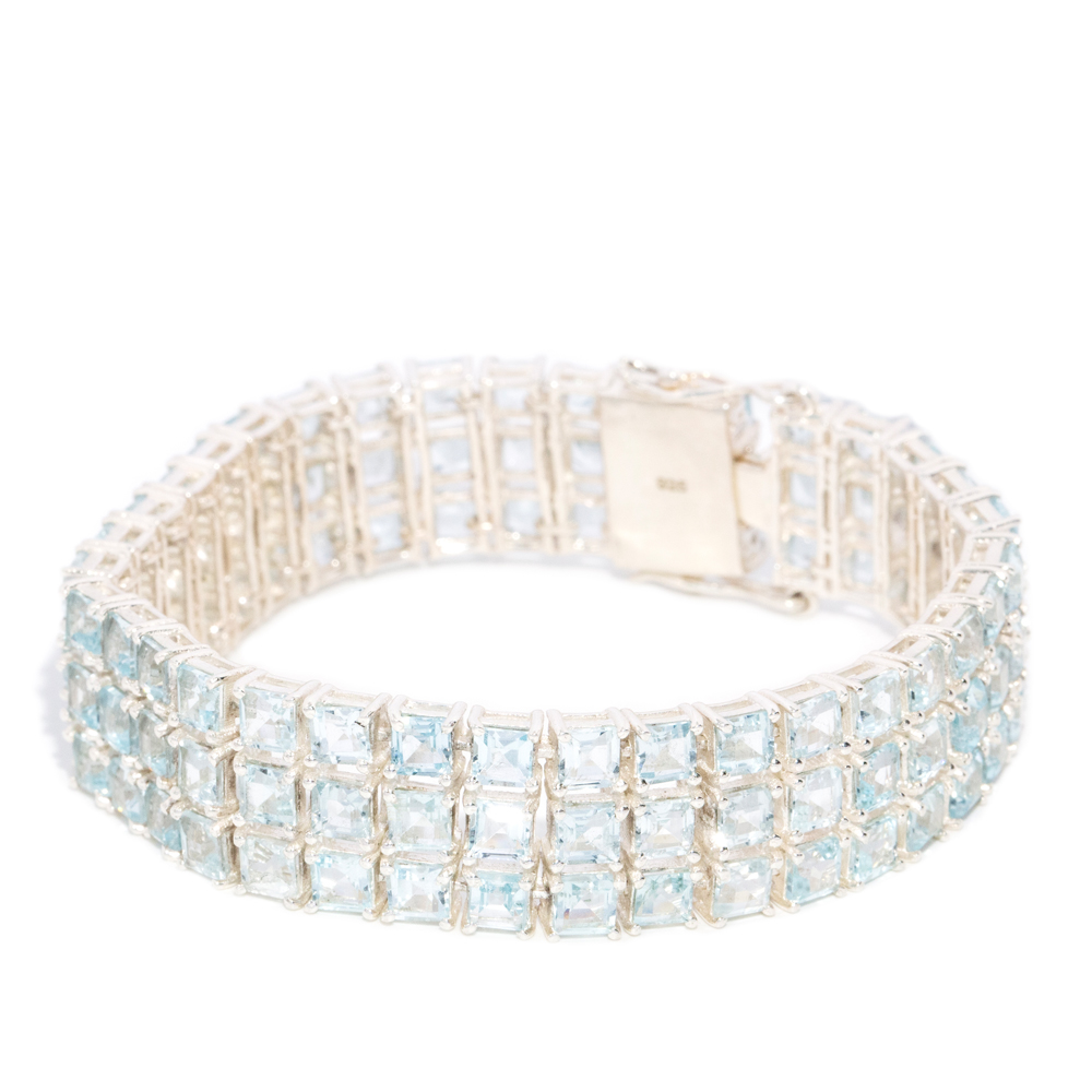 197 · Sterling Silver Topaz Line Bracelet