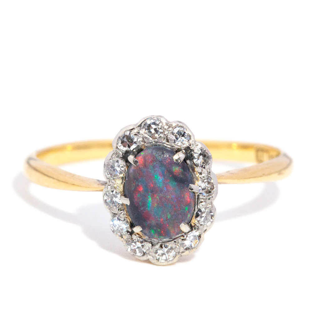 19 · Yellow Gold Grey Opal and Diamond Halo Ring