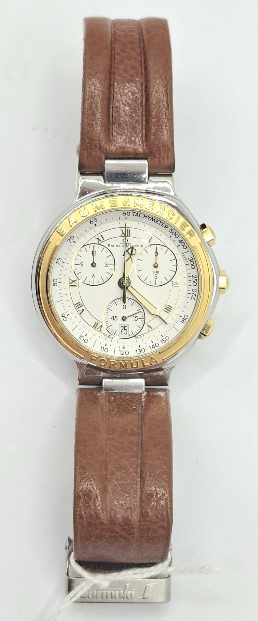 244 · BAUME AND MERCIER GENTS WRIST WATCH