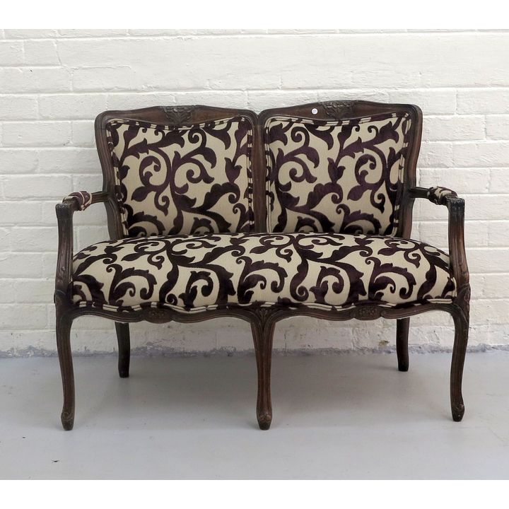 UPHOLSTERED SETTEE