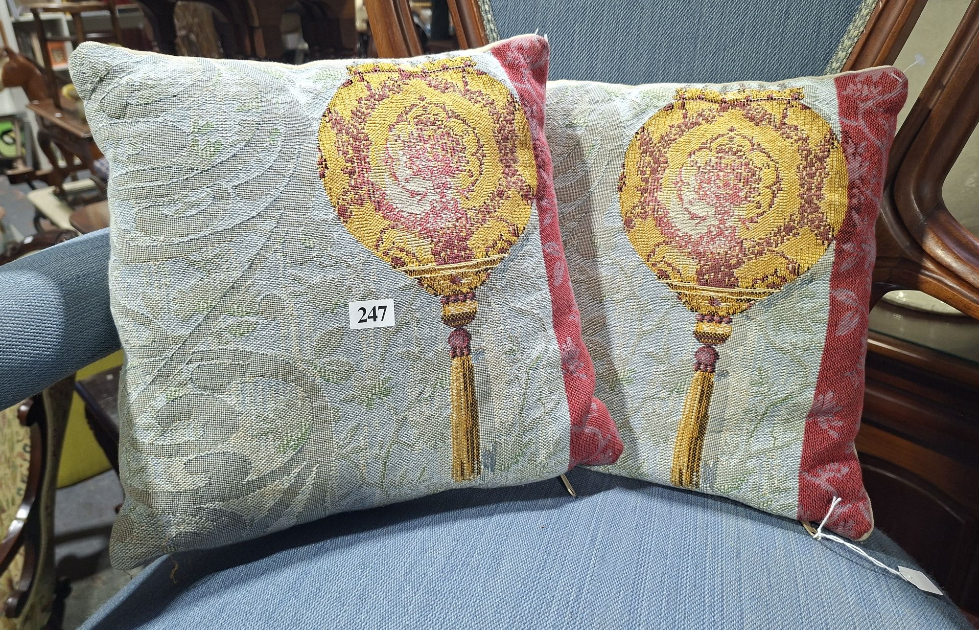 A Pair Of Tapestry Cushions