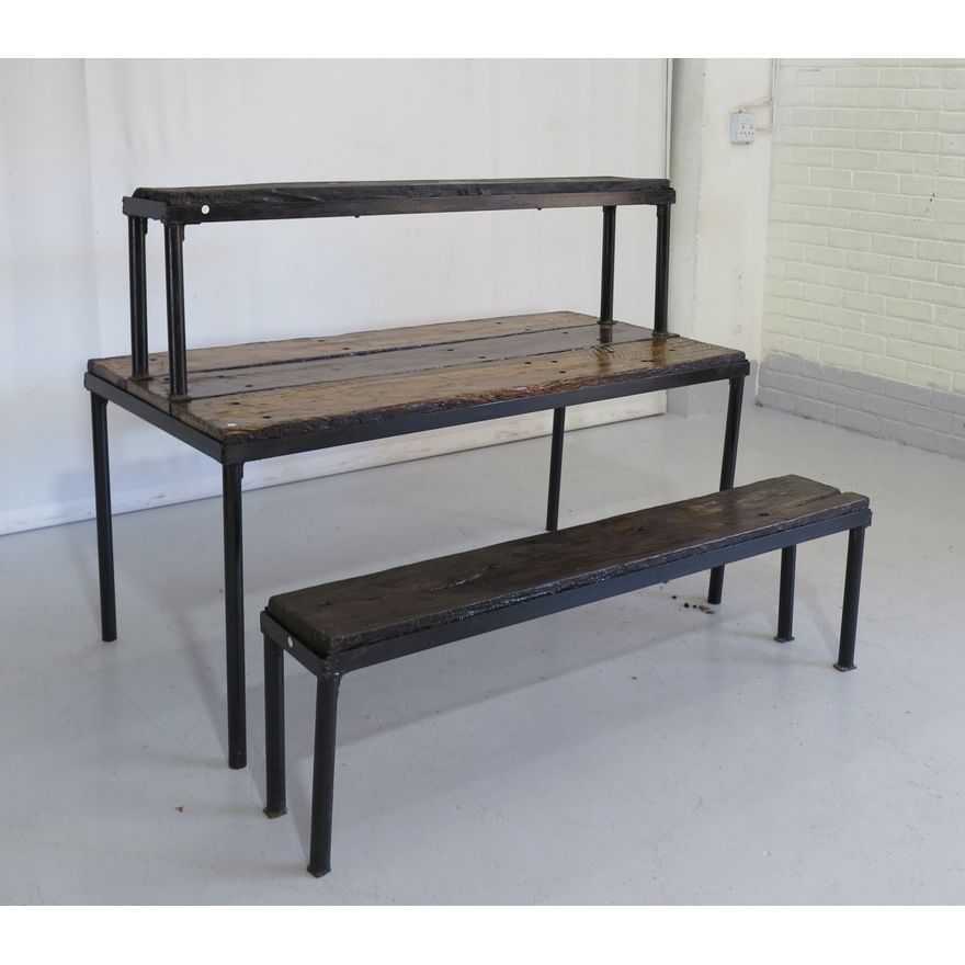 STEEL BASE GARDEN TABLE AND PAIR OF BENCHES