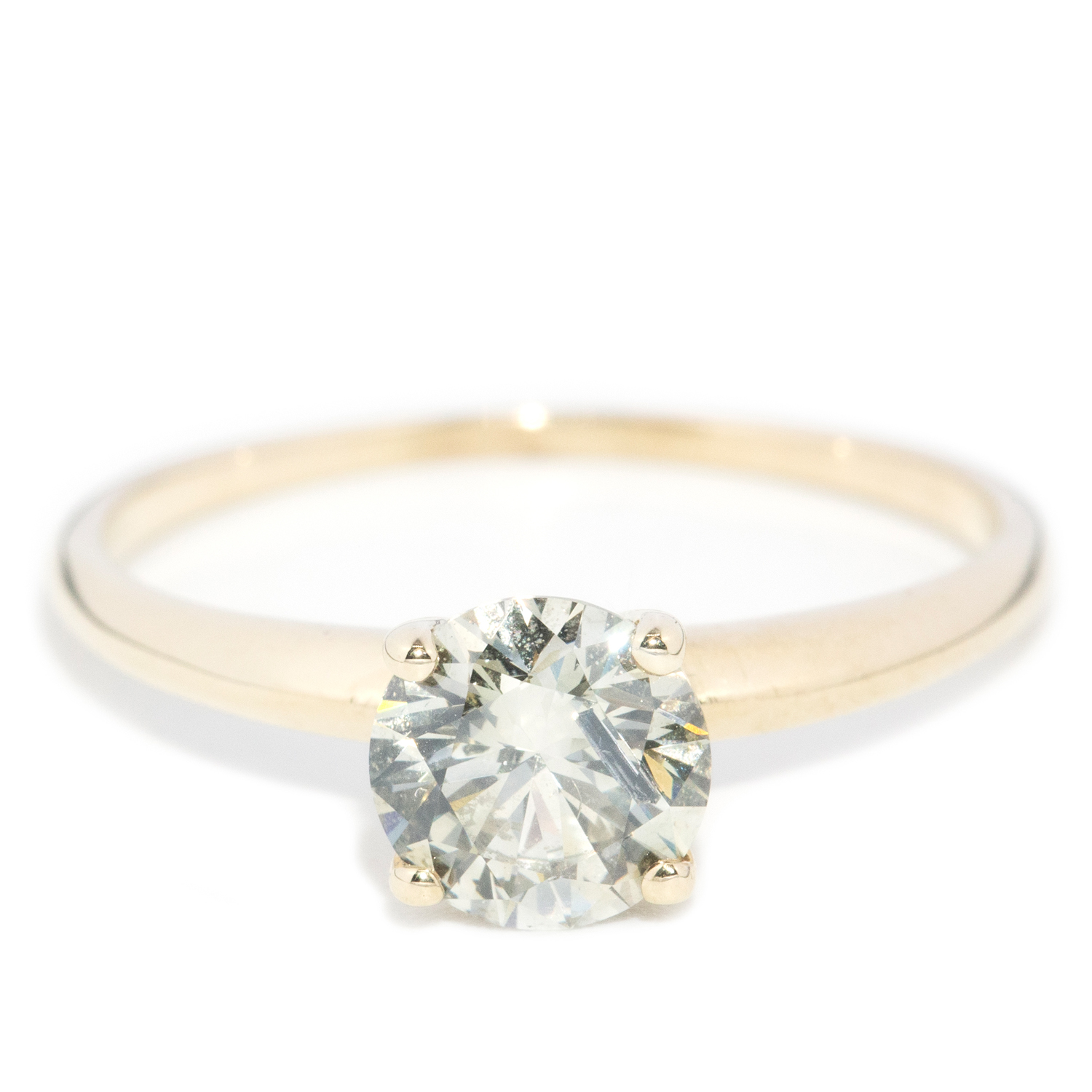 10 · Diamond Solitaire Ring in 14ct Gold