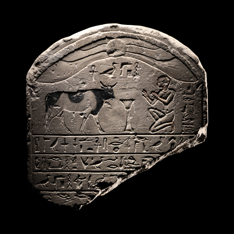 An Egyptian Limestone Round-Topped Stele
Height 6 inches (15 cm).