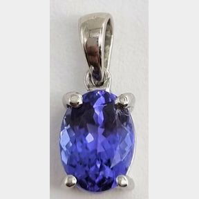 1.16CTS TANZANITE SET IN 18CT WHITE GOLD PENDANT