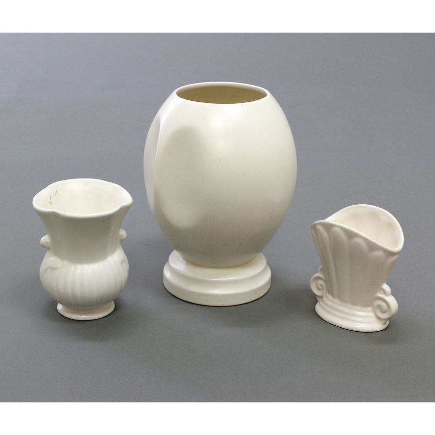 Crown Lynn Potteries (attrib.) and Sylvac, Two small white vases, possibly Titian Studio, and a Sylvac vase