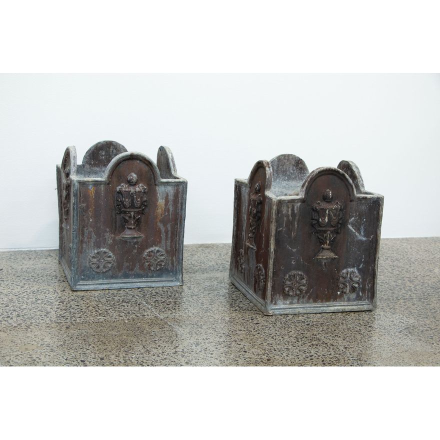 A pair of lead planters
