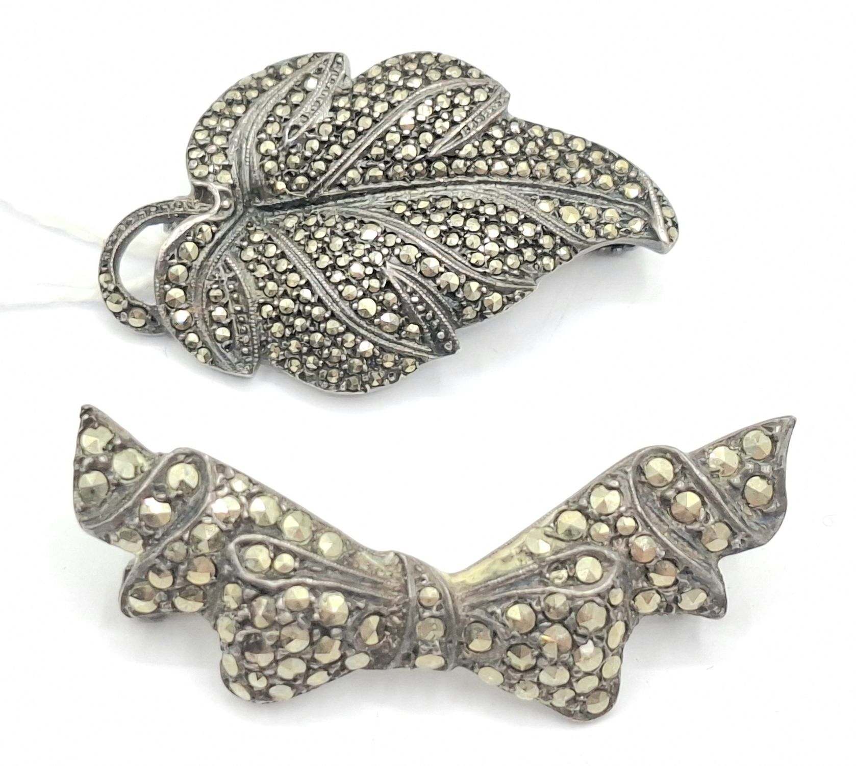 1058 · STERLING SILVER MARCASITE BROOCHES