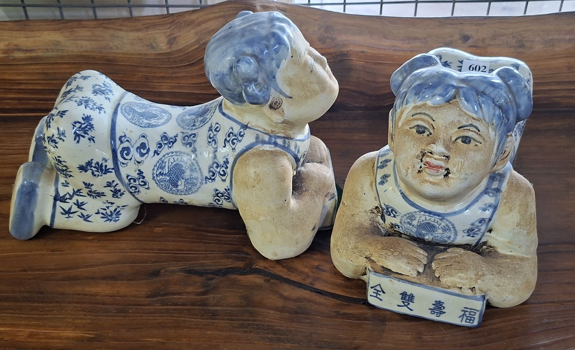 A Pair Of Chinese Figural Pillows
