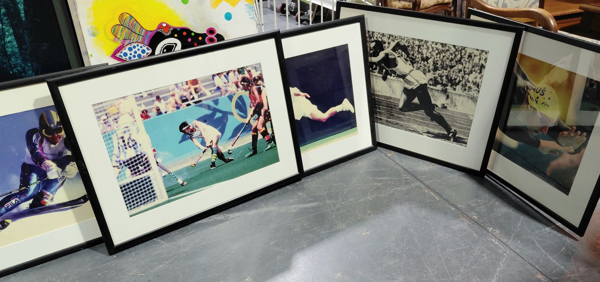 A Group Of 5 Sporting Photographs