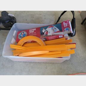 Container of Hot Wheel Tracks and Mickey Mouse Tent