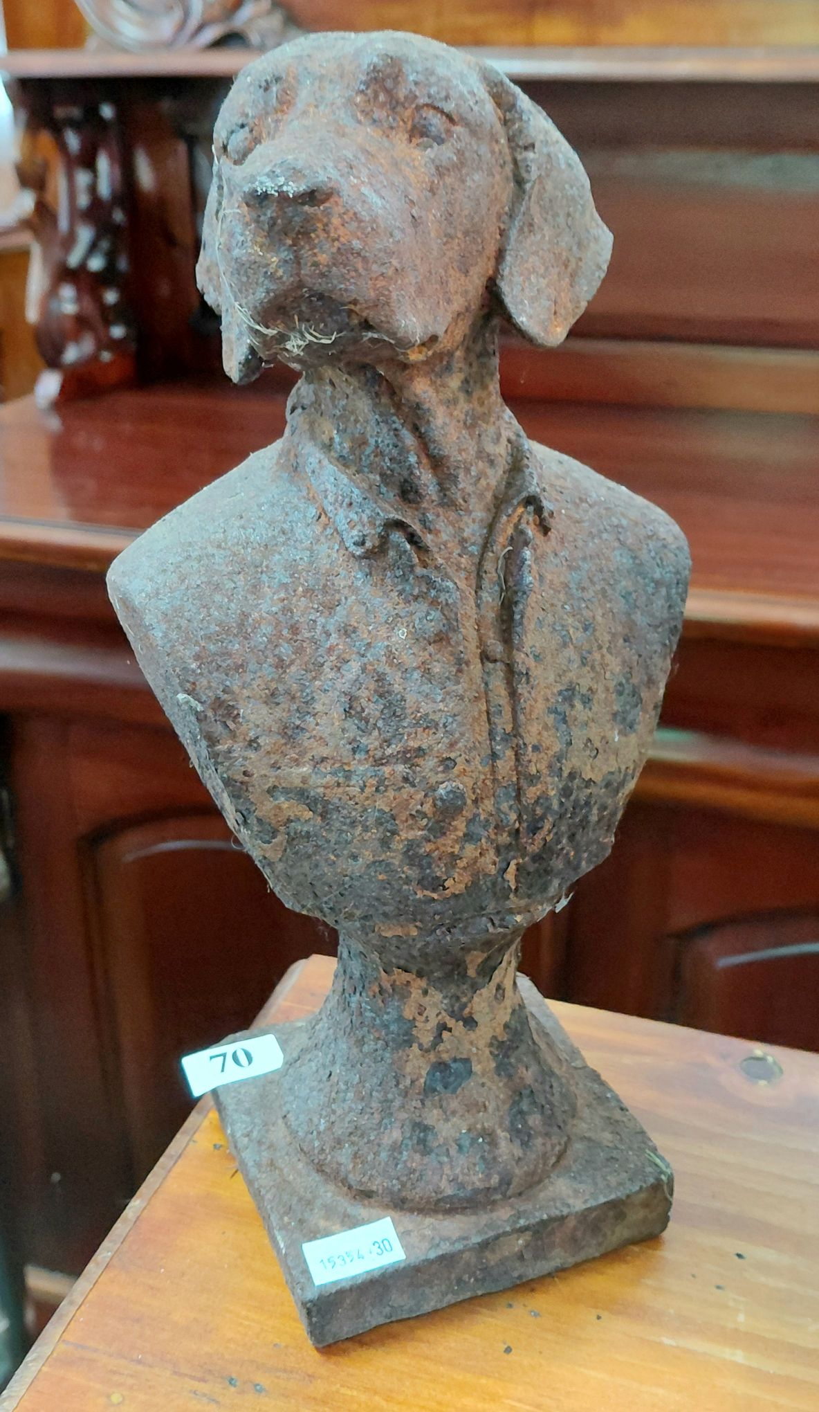 70 · CAST IRON BUST