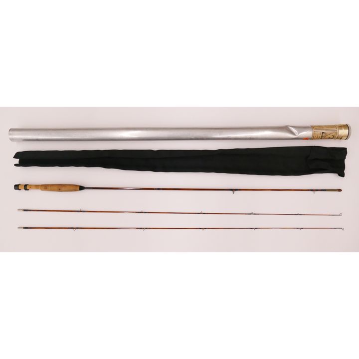 Wanigas Supreme Split Bamboo Fly Fishing Rod with cloth bag and aluminum storage tube.