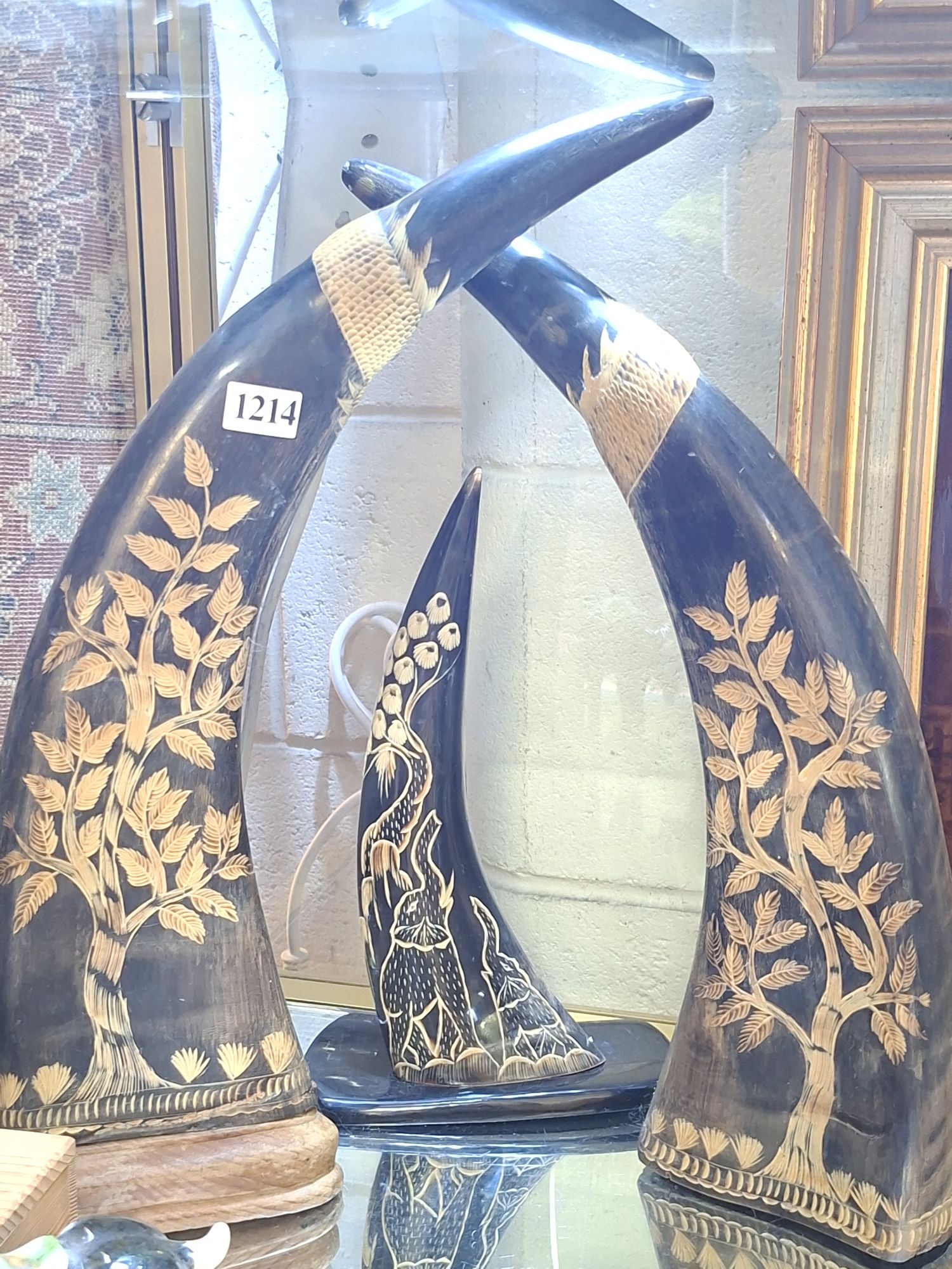 Three Carved Horn Ornaments