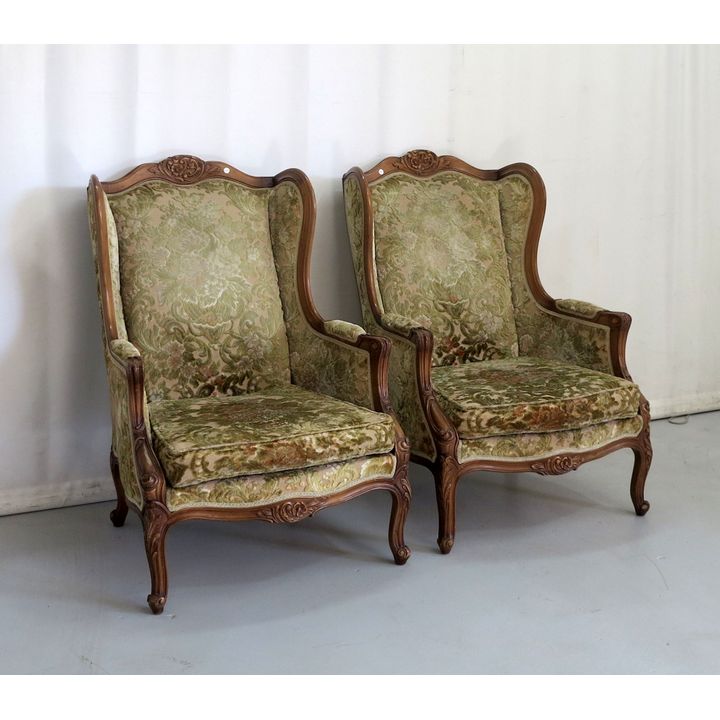 PAIR OF UPHOLSTERED BEECHWOOD WINGBACK CHAIRS