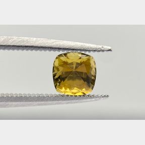 0.76CT CUSHION CUT RARE YELLOW TANZANITE .HKD CERTIFIED