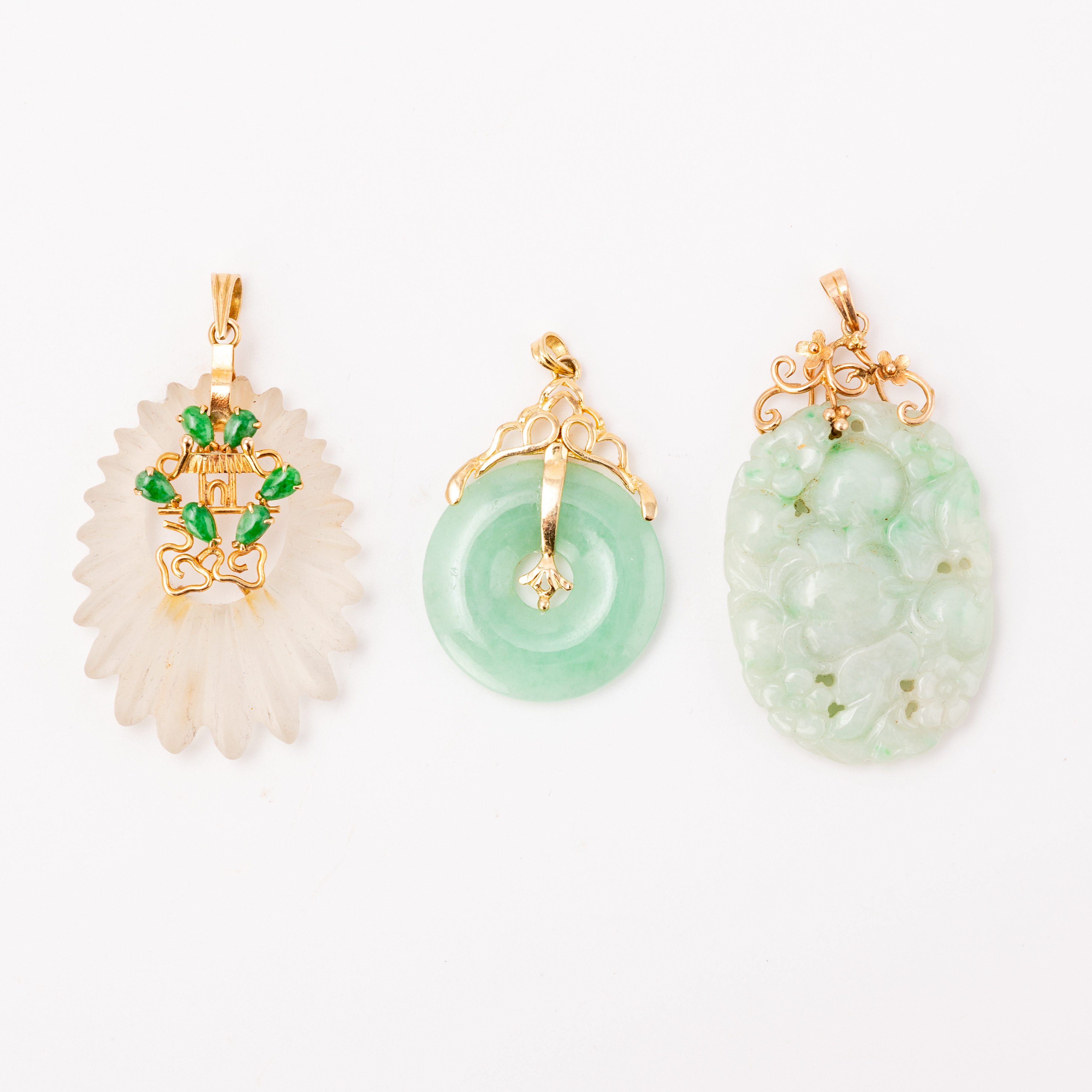 Three 14ct Gold Jade Pendants