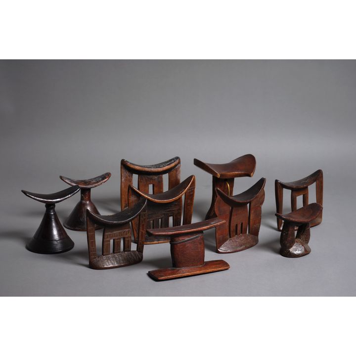 A collection of ten African hardwood headrests