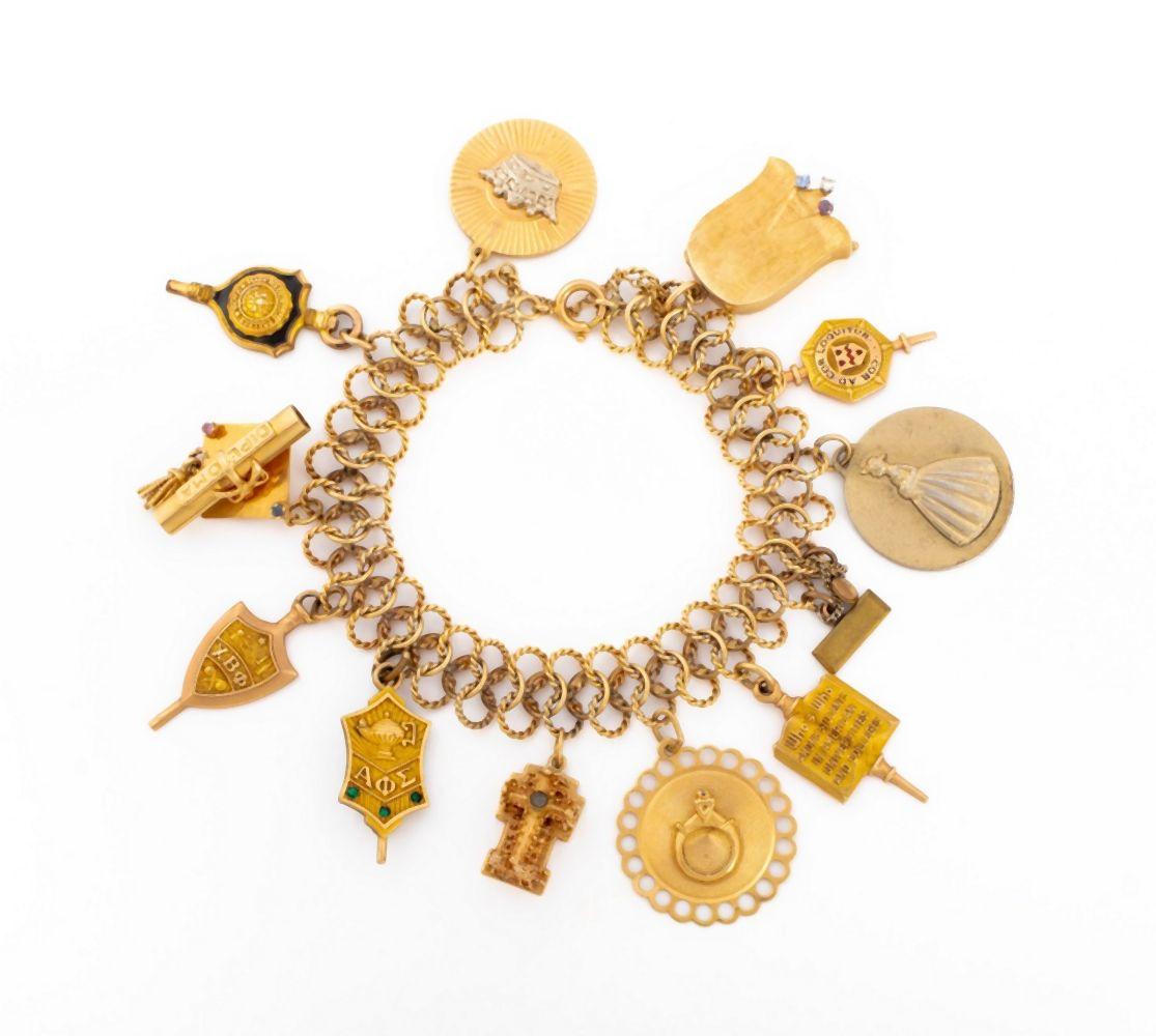 Vintage 14K Yellow Gold Charm Bracelet | Auctions at Showplace