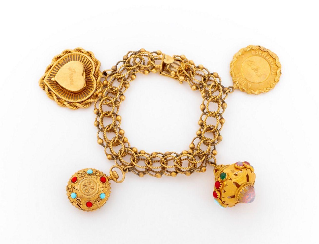 Vintage 14K Yellow Gold Charm Bracelet | Auctions at Showplace