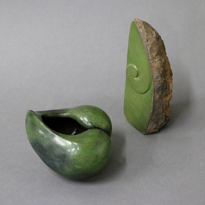 Robyn Stewart - A small heart shaped bowl and a small blade form