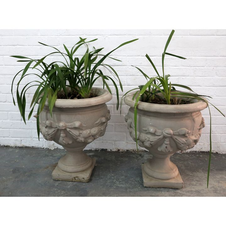 PAIR OF CONCRETE PLANTERS