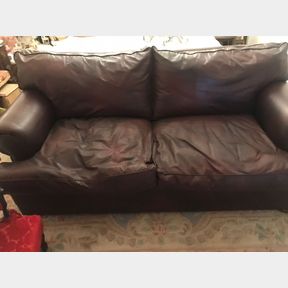 Beautiful oxblood nappy leather couch in immaculate condition. so comfortable