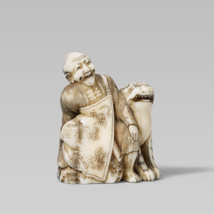 A walrus tusk netsuke of Bunkan Zenshi. Second half 19th century