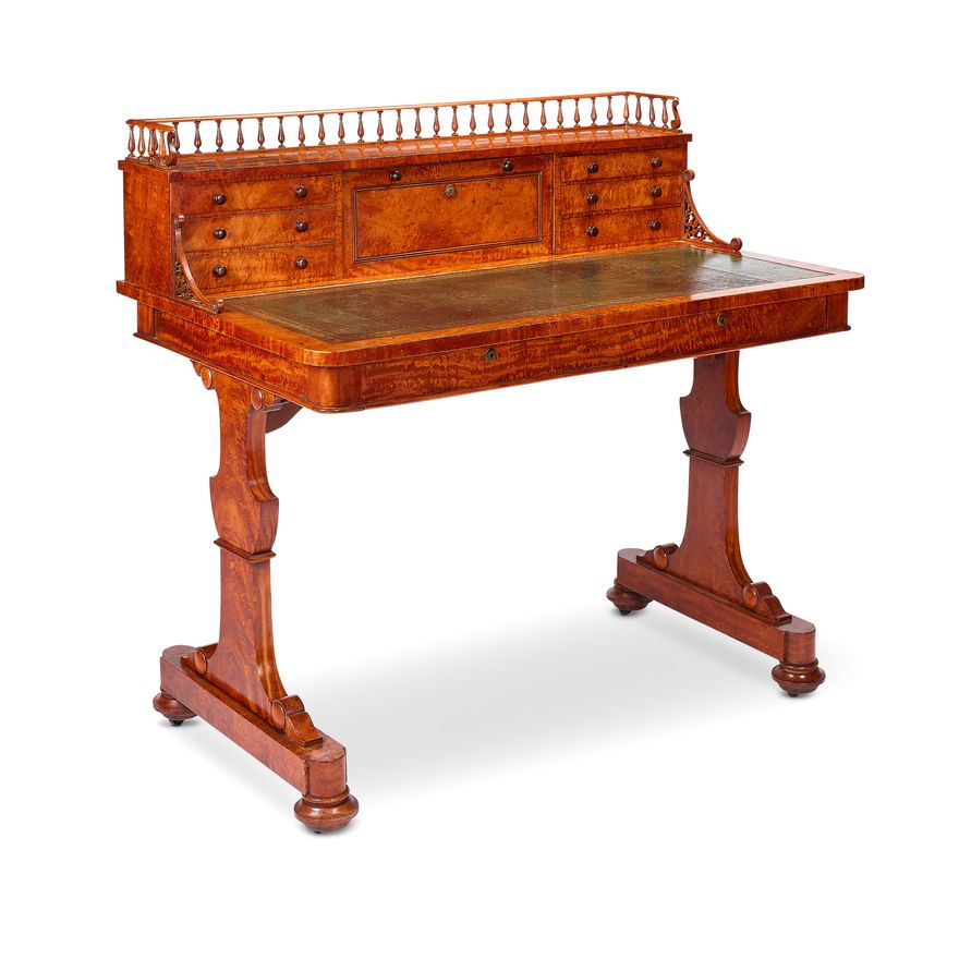 A late Regency maple writing desk
