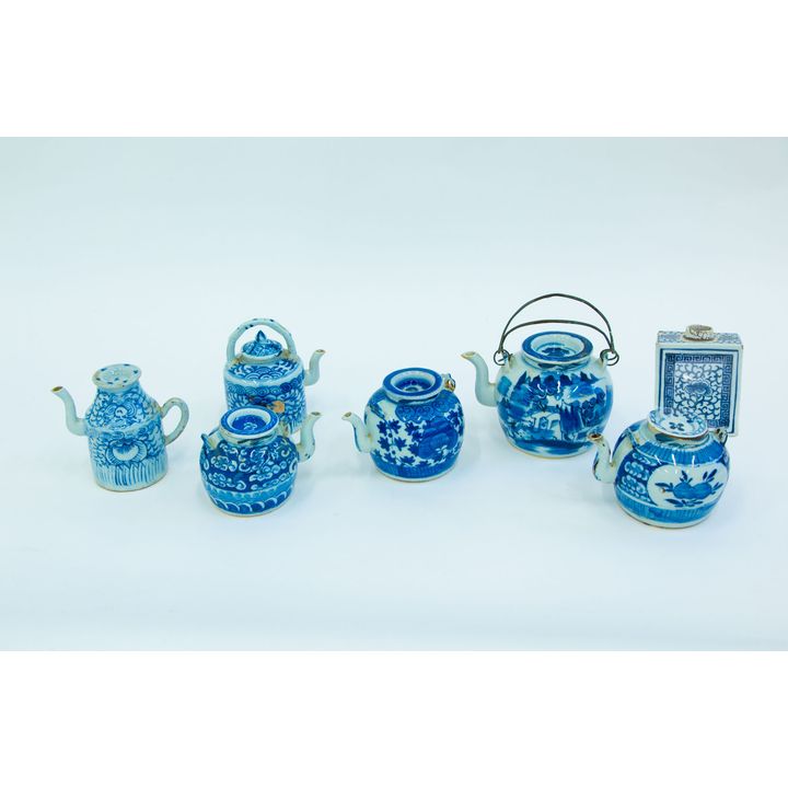 Six early-20th-century Chinese blue and white lidded teapots