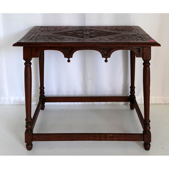 CARVED OAK CENTRE TABLE