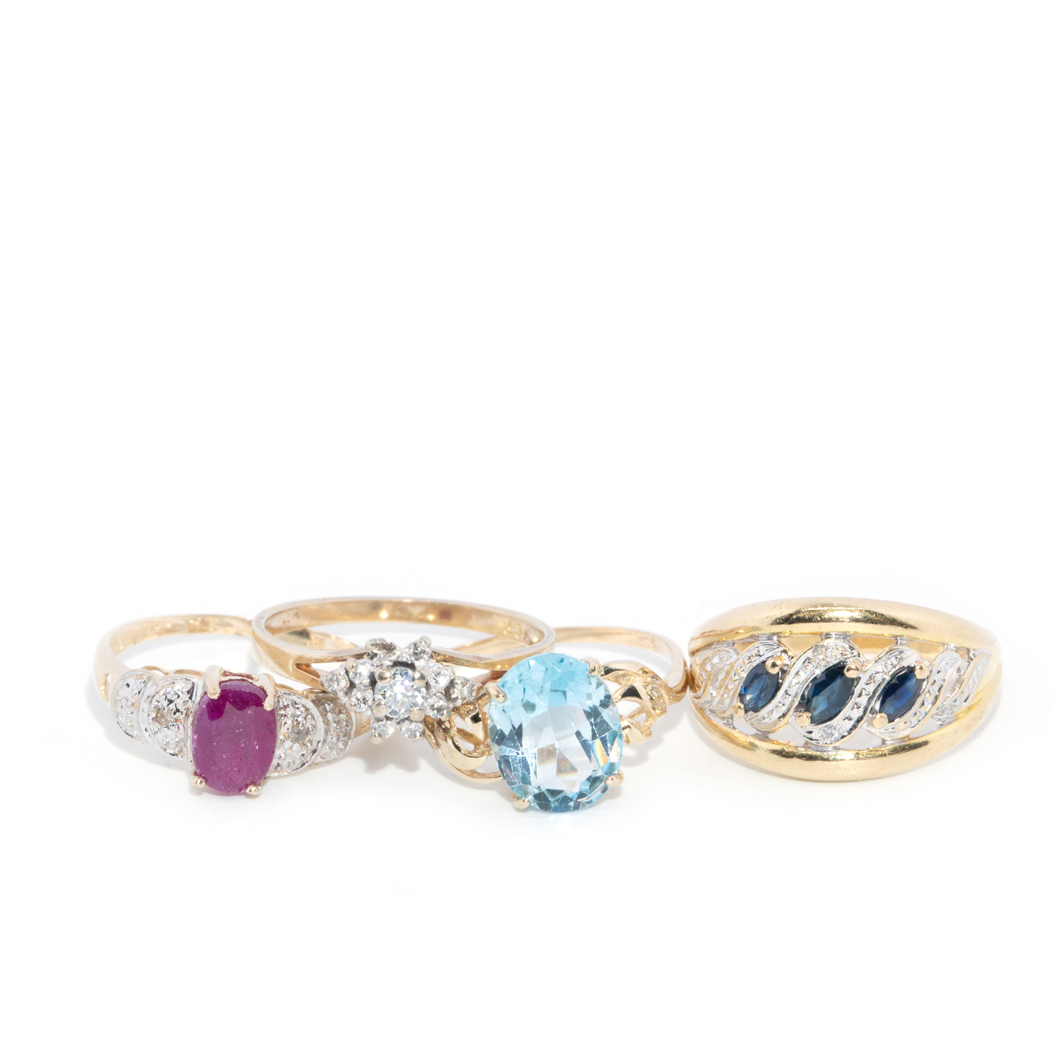 Four 9 Carat Gold Rings