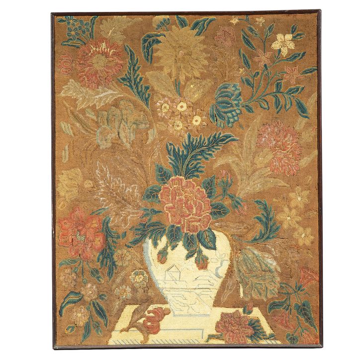 An 18th century needlework in a later frame