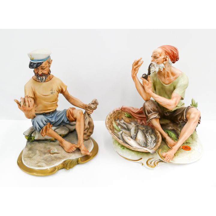 2pc Capodimonte Porcelain Fisherman Figures with Basket of Fish- approx 9'' (one has repair)