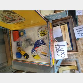 Assorted buttons, product container, and other collectibles