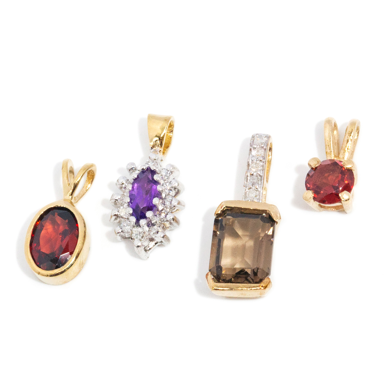 Assortment of 9ct Gold Gem Set Pendants