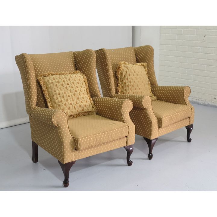 PAIR OF UPHOLSTERED WINGBACK CHAIRS