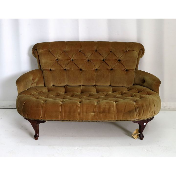 LOW UPHOLSTERED SETTEE