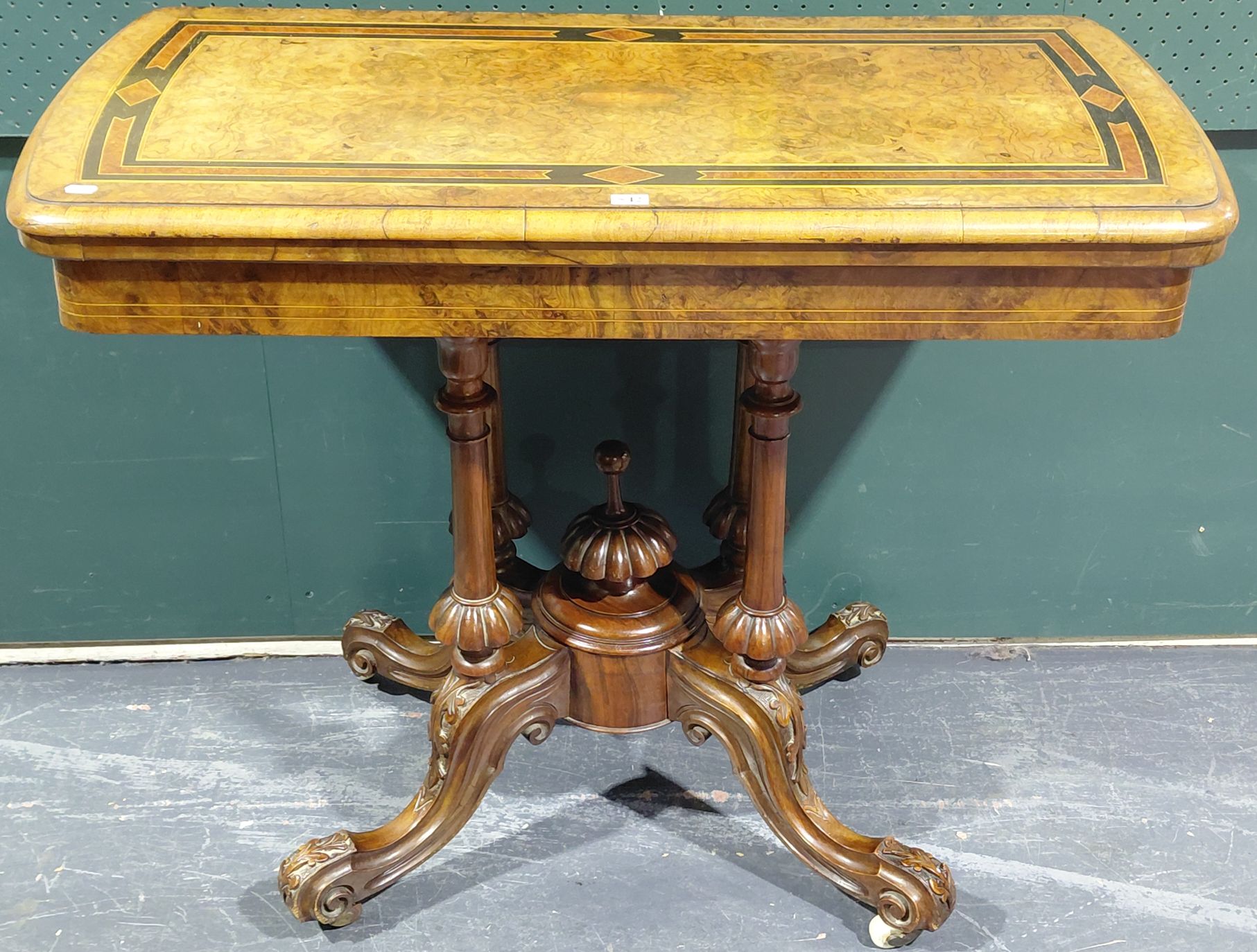 542 · A VICTORIAN FOLDING CARD TABLE