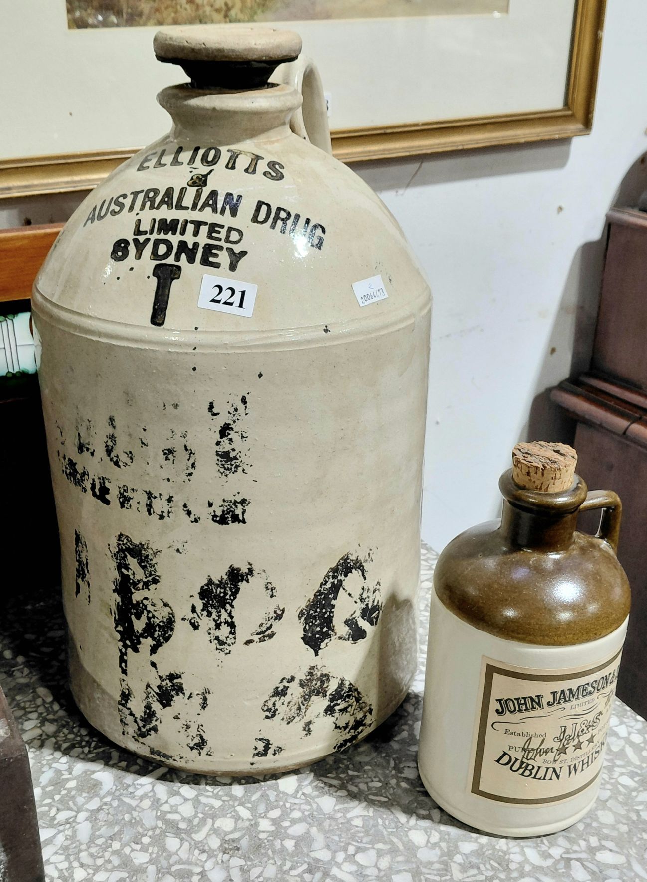 221 · STONEWARE DEMIJOHN