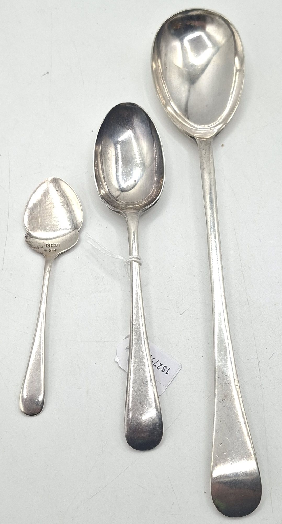 1256 · TWO STERLING SILVER SPOONS WITH SERVING SPOON