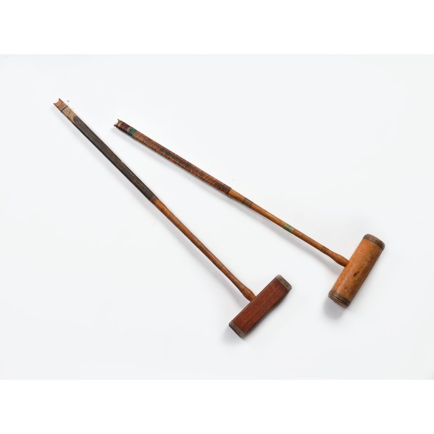 Two wooden croquet mallets